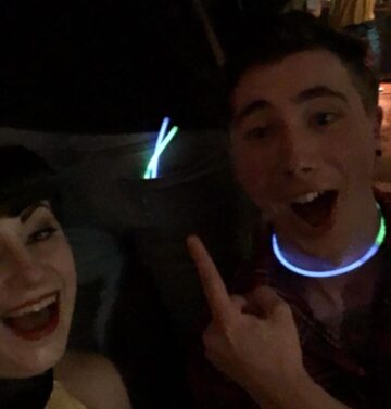 July 2016 Carolyn and Matt met at the Manchester Comic Con after party, Carolyn still dressed as Watchman's Silk Spectre. Carolyn's sister in law deb (while dressed as Harley Quinn) handed her bat to Matt to hold while she looked for something in her bag, Carolyn noticed and went over to talk to Matt. After chatting over some rum and putting glowsticks in the arse pocket of someone's jeans Carolyn screamed at Matt to get in the photo with a random mans arse.